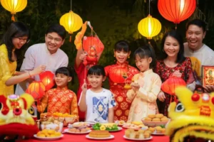 Families celebrating Mid-Autumn Festival with traditional items.