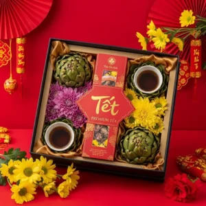 Hộp quà Tết cao cấp có trà hoa cúc, trà Atiso, hoa tươi và phụ kiện ngày Tết.